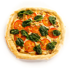 Pizza with spinach an tomatoes