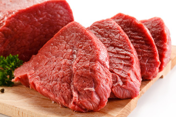 Fresh raw beef steaks on white background 
