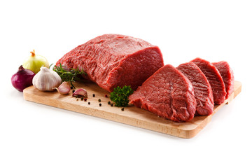 Fresh raw beef steaks on white background 