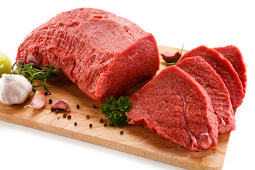 Fresh raw beef steaks on white background 