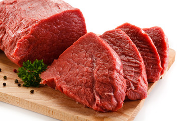 Fresh raw beef steaks on white background 