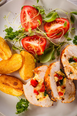 Stuffed chicken fillets and vegetables 