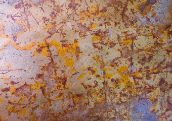 Texture of an old jelly surface with peeling paint and rust stains.