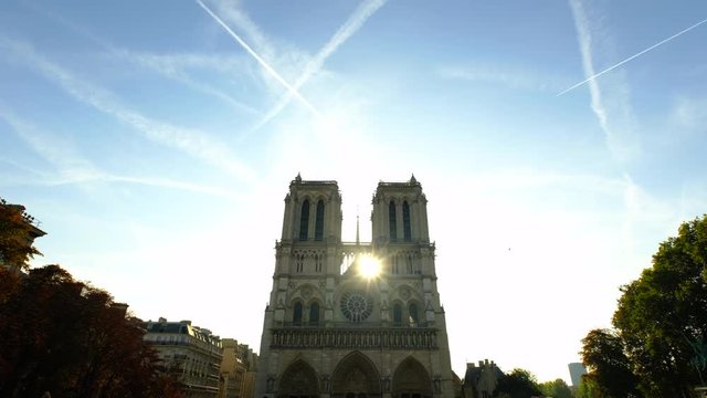 The sun is shinging through the cathedral Notre Dame on Ile de la Cite.