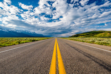 Empty open highway in Wyoming - Powered by Adobe