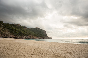 Empty winter beach. Seascape with castle rock of Cleopatra beach