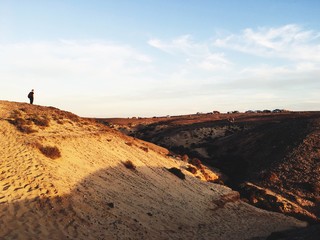 Fototapeta premium man on mountain of Lanzarote, Spain