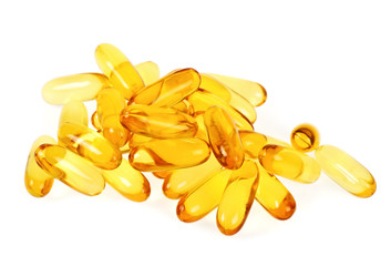 Capsules from fish oil on white background