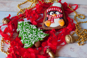 Beautiful Christmas honey cookies. Shapes of penguin, pine tree