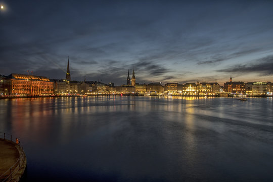 nightly panorama over the lake Alster into the city of Hamburg Germany