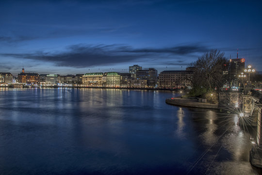 nightly panorama over the lake Alster into the city of Hamburg Germany