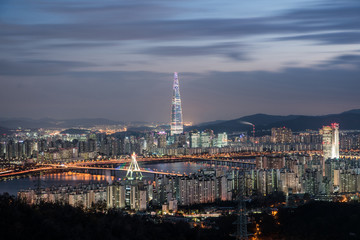 Fototapeta premium Beautiful city in night, cityscape of Seoul, South Korea, modern building and architecture at nighttime