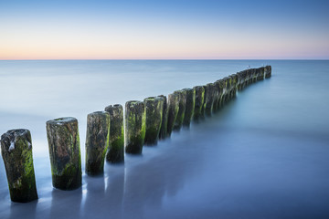 Long exposure breakwater photo. Baltic sea shore.
