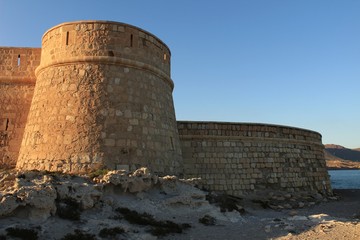 Fototapeta na wymiar Fortress under blue sky