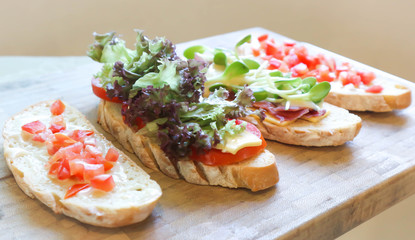 canape , bread with ham and cheese