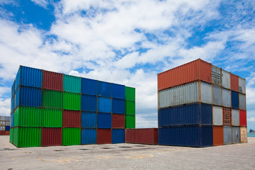 Fototapeta premium Industrial crane loading Containers in a Cargo freight ship