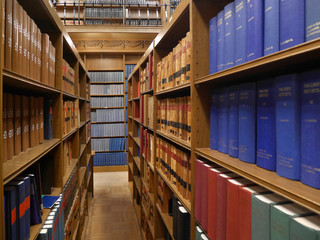 Obraz premium LONDON - SEPTEMBER 2016: Even in the digital age, legal researchers still sometimes turn to old print volumes.