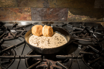 Biscuits and Gravy in black iron skillet