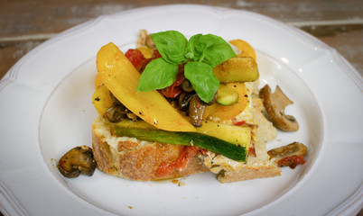 freshly prepared open faced vegetable sandwich on homemade bread