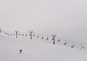Lone Skier and chairlift
