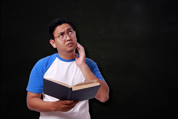 Young Man Reading Book