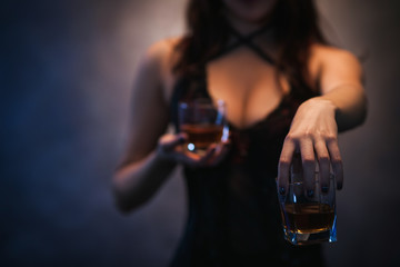 Bad influence. Woman offering alcohol and seducing. Amoral and indecent lifestyle concept