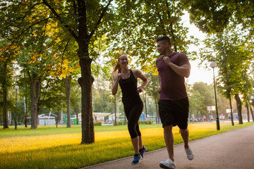 love couple outdoor sport morning jogging together concept. pair training. sportsman spouses lifestyle.