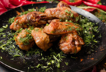 ready made fried chicken wings dish food photography concept. fatty and unhealthy eating. meat fans.