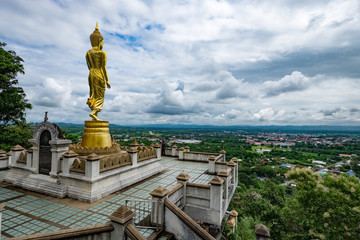 Fototapeta premium Golden Buddha statue at Pha Ta Kho Noi temple, Nan province, Thailand