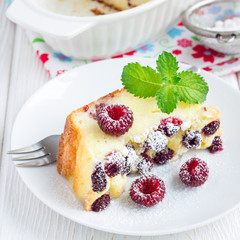 Homemade casserole with cottage cheese, semolina and raspberries, square format