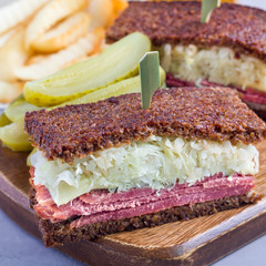 Classic reuben sandwich, served with dill pickle, potato chips, square