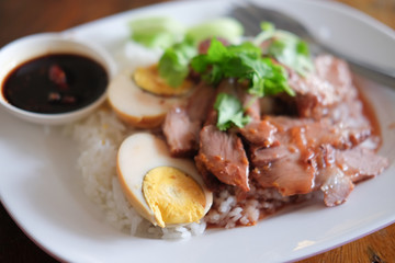 Barbecued red pork and boiled egg