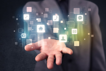 Businessman holding blue applications