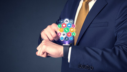 Businessman wearing smartwatch.
