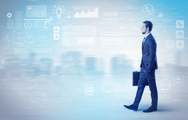 Fototapeta premium Businessman walking with database concept around