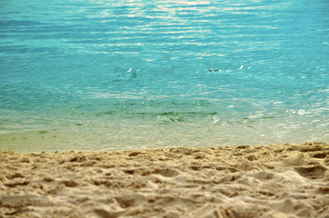 Fototapeta na wymiar Selective focus of beach coast with water