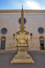 Elephant by Lorenzo Bernini with egyptian obelisk in front of church Santa Maria Minerva in centre...