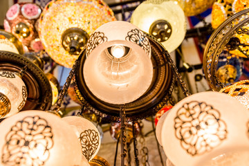 Fototapeta na wymiar Traditional handmade decorative mosaic Turkish lamps for sale