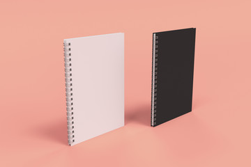 Two notebooks with spiral bound on red background - 182229485
