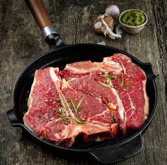 fresh raw T bone steaks