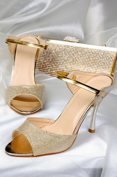 A Pair Of Gold Sandals