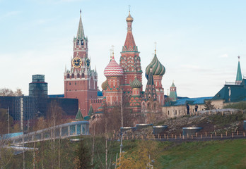 Obraz premium November 13, 2017 Moscow, Russia. A view on the Spassky Tower of the Moscow Kremlin and St. Basil's Cathedral.