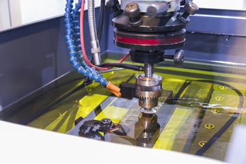 Electrical discharge machining ;spark machining ; industry equipment background