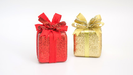 Red and gold gift box on a white background.