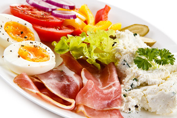 Breakfast - boiled egg, bacon, cottage cheese and vegetables