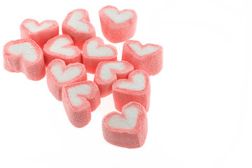 Obraz premium Pink heart shaped marshmallows isolated