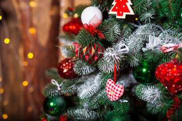 Close up Christmas tree decorated. No people. Home comfort of modern house.