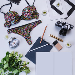 Flat lay background with woman underwear and different accessories on it