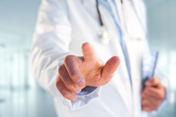 Doctor pointing his finger at the hospital