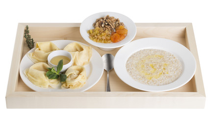 Russian pancakes with oatmeal and dried fruits.